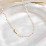 Conjunto com Cruz e Pérolas